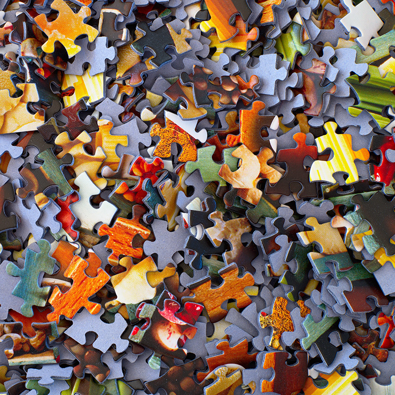 A pile of puzzle pieces that when put together create a successful content marketing strategy